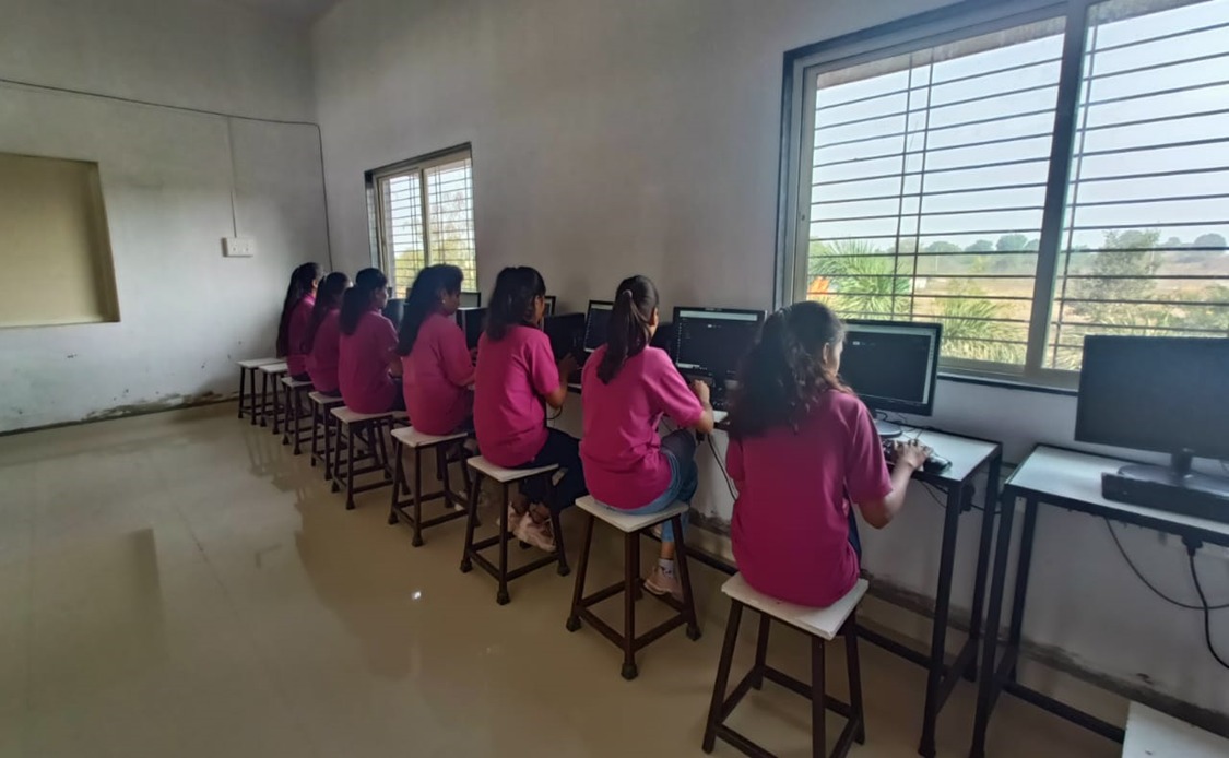 Students completing practical work in a computer lab