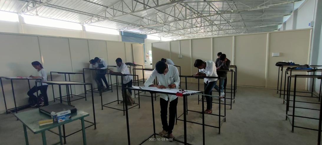 Students completing a surveying drawing practical